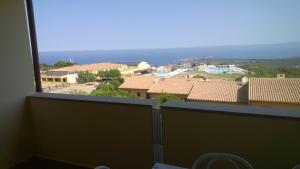 a view from the balcony of a house at Appartamento Residence Isola Rossa in Isola Rossa