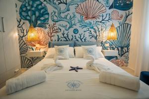 Ένα ή περισσότερα κρεβάτια σε δωμάτιο στο Ricci & Capricci Exclusive Room