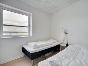 Ένα ή περισσότερα κρεβάτια σε δωμάτιο στο Apartment Geraldine - 250m from the sea by Interhome