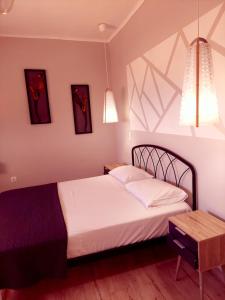 Postel nebo postele na pokoji v ubytování Nota apt 'vacation near the sea' 2