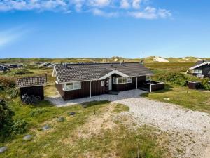 an aerial view of a house in a field at Holiday Home Thrugot - from the sea by Interhome in Bjerregård