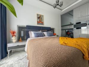 Postel nebo postele na pokoji v ubytování Qoople Elite 4 Elize apartments Premium location near Kleopatra