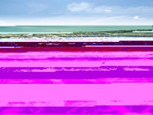 a pink fence with the ocean in the background at Holiday Home Tola - 450m from the sea by Interhome in Bjerregård