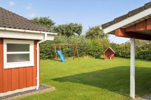 a yard with a playground with a swing at LN76124-Hjorring-Nordsovej-37 in Hjørring