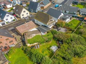 an aerial view of a house in a residential neighborhood at Holiday Home Eluisa - 300m from the sea by Interhome in Thyborøn +35 photos
