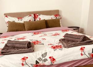 Postel nebo postele na pokoji v ubytování Julia Apartament