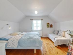 Ένα ή περισσότερα κρεβάτια σε δωμάτιο στο Apartment Evangelina - 350m from the sea by Interhome