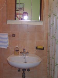 Kúpeľňa v ubytovaní Rooms MUDRAC