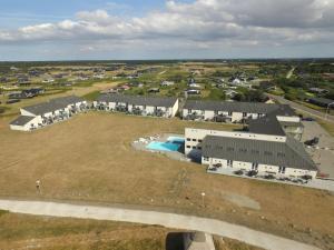 an aerial view of a large building with a pool at Apartment Salka - 150m from the sea by Interhome in Løkken