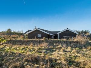 a house in the middle of a field at Holiday Home Oskarvine - 900m from the sea by Interhome in Løkken