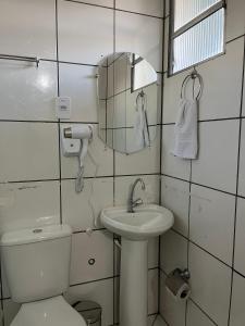 Koupelna v ubytování Hotel Aconchegante + 113 fotografií