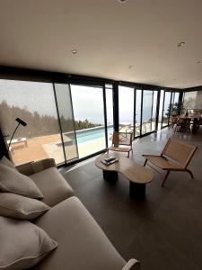 a living room with a couch and a table at Casa Arriettas in Tijarafe