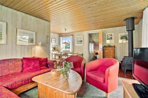 a living room with a couch and two chairs and a table at LN1781-Hjorring-Vadehavsvej-14 in Hjørring