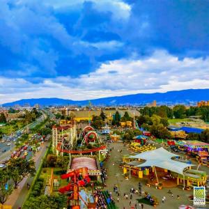 an aerial view of an amusement park with a roller coaster at ESPACIOSA y MODERNA SUITE in Bogotá