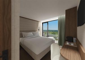 Katil atau katil-katil dalam bilik di Hotel & Spa Amoria La Baule, a member of Radisson Individuals +16 gambar