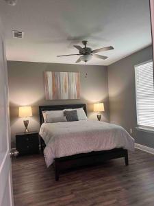 Postel nebo postele na pokoji v ubytování Gateway To The Gulf