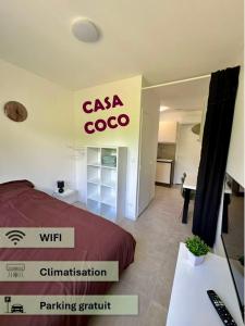 Ένα ή περισσότερα κρεβάτια σε δωμάτιο στο Studio CASA COCO-2pers Béligneux