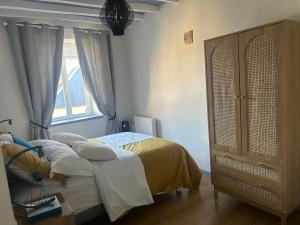 Postel nebo postele na pokoji v ubytování Gîte en Sarthe + 13 fotografií