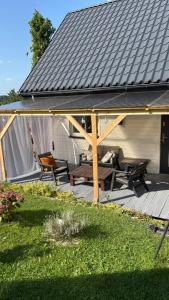 Κήπος έξω από το Mały biały domek Wadowice SPA jacuzzi sauna Gorzen blisko Wadowic +25 φωτογραφίες