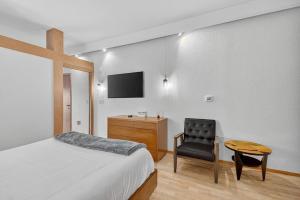 Postel nebo postele na pokoji v ubytování 302 Village Duo | European Village + 39 fotografií