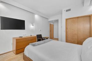 TV a/nebo společenská místnost v ubytování 302 Village Duo | European Village