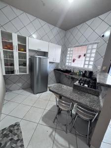Kuchyň nebo kuchyňský kout v ubytování Casa BemTeVi próximo ao Shopping