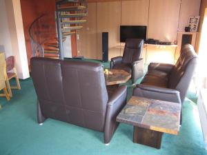 Posezení v ubytování Wohnung in Waldnähe + 28 fotografií