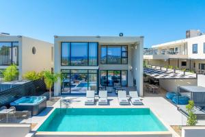an image of a house with a swimming pool at Villa Trapezia Diamond in Kolymbia