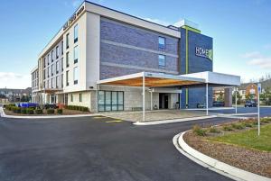 a parking lot in front of a hotel at Home2 Suites By Hilton Taylor in Taylor
