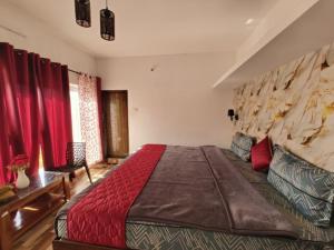 Katil atau katil-katil dalam bilik di Tea Garden stays +29 gambar