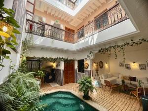 Bazén v ubytování RIAD SHANAM Location Privative nebo v jeho okolí