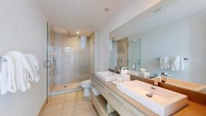 a bathroom with a sink and a toilet and a shower at Hyde Beach House 3BR2BA in Hollywood +33 photos