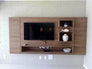 TV a/nebo společenská místnost v ubytování Ykutiba Imbassaí - Apartamento 2 Quartos - H03