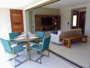 Posezení v ubytování Ykutiba Imbassaí - Apartamento 2 Quartos - H03