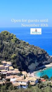 an image of a resort on a hill next to the ocean at Myrto Homes Lefkada Agios Nikitas Greece in Agios Nikitas