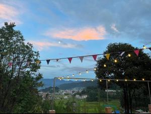 a string of lights with a view of a city at Holiday cabin in Sibey in Hāpoli