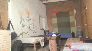 Ένα ή περισσότερα κρεβάτια σε δωμάτιο στο Tribu 13 Eco Village