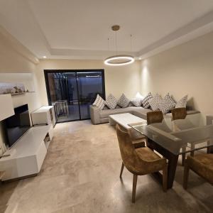 Un lugar para sentarse en Appartement Marrakech City Golf Noria