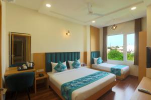 Postel nebo postele na pokoji v ubytování Hotel The Best Delhi Airport + 29 fotografií
