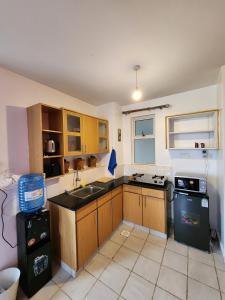 Kuchyň nebo kuchyňský kout v ubytování The Nest