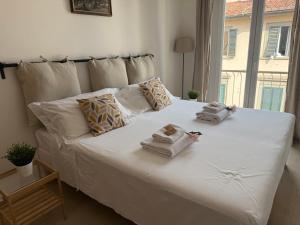 Postel nebo postele na pokoji v ubytování SMN-Duomo GuestHouse