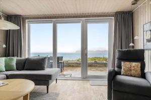 un soggiorno con vista sull'oceano di SJ269-Hejls-Ved-Kysten-1 a Hejls Altre 21 foto