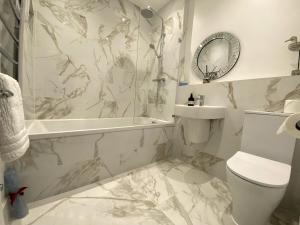 Koupelna v ubytování Garden Flat