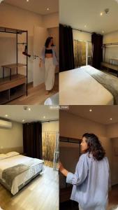 a woman standing next to a bed in a room at Condomínio Eclipse Village, Praia de Juquehy in São Sebastião