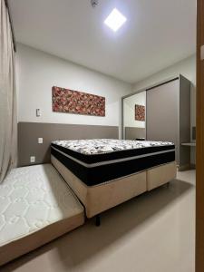 En eller flere senge i et værelse på Park Veredas acesso ao Rio Quente