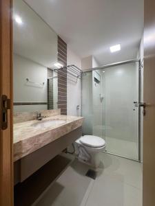 Et badeværelse på Park Veredas acesso ao Rio Quente