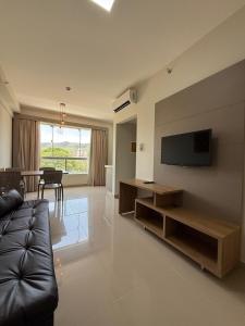 Et tv og/eller underholdning på Park Veredas acesso ao Rio Quente + 24 billeder