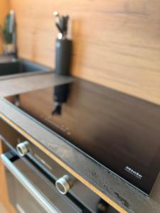 Nhà bếp/bếp nhỏ tại DMI Premium Apart Gdansk-Beach +26 ảnh