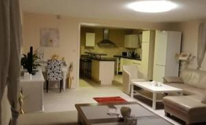 Kuchyň nebo kuchyňský kout v ubytování Apartment bis 7 Peesonen bei Hamburg + 6 fotografií