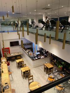 an overhead view of a restaurant with tables and a counter at Comfortable home GH in Accra